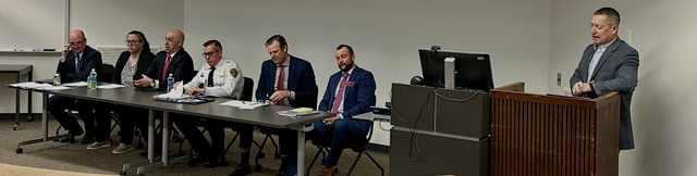 Kevin M. Zielinski seated with the panel at A Critical Lens on Current Issues, SIU Simmons Law School, February 2024
